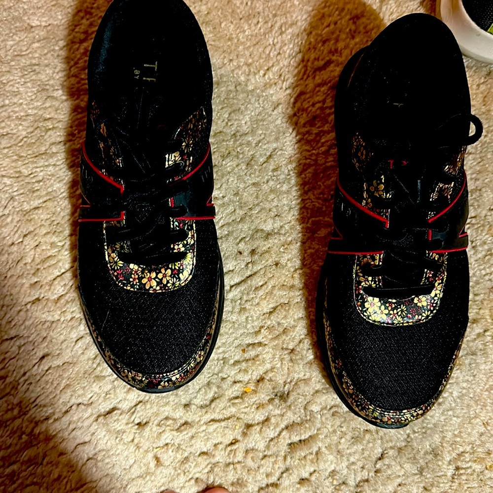 Black tennis shoes I own to many Comfortable and unique